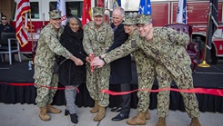 From the left, U.S. Navy Rear Adm. Matthew Case, commander, Naval Medical Forces Atlantic; Lisa Lucas-Burke, vice mayor, City of Portsmouth’ Surgeon General of the Navy Rear Adm. Darin Via; Dr. Michael Malanoski, deputy director, Defense Health Agency; U.S. Navy Capt. Shelley Perkins, deputy commander, Naval Medical Forces Atlantic; and U.S. Navy Capt. Brian Feldman, commanding officer, Navy Medicine Readiness & Training Command Portsmouth, cut a ribbon during a trauma center ribbon cutting ceremony in front of NMCP’s emergency room entrance on Dec. 8.  (Photo: U.S. Navy Mass Comm. Spec. 2nd Class Dylan M. Kinee)