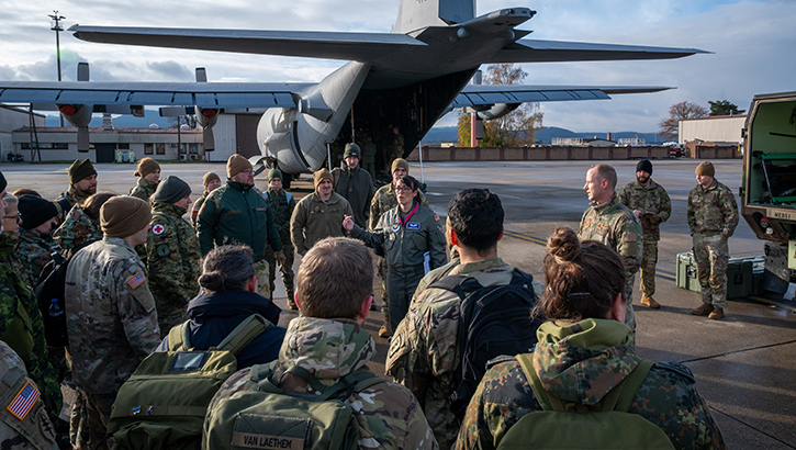 U.S. Air Force Maj. Amanda Peterson, 86th Aeromedical Evaluation Squadron assistant director of operations, briefs NATO Medical Evaluation Course students prior to a mock evaluation