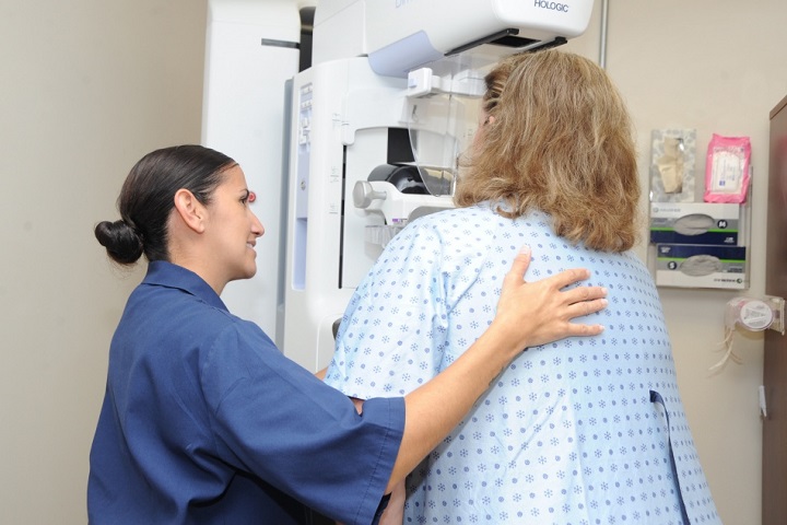 Navy Chief Hospital Corpsman Naomi Perez, a certified mammogram technician, conducts a mammogram for a patient at Naval Hospital Pensacola. A mammogram is a low-dose x-ray procedure used to detect the early stages of breast cancer. October is Breast Cancer Awareness Month, and NHP is taking the opportunity to educate patients about the dangers of breast cancer and the importance of getting checked. (U.S. Navy photo by Mass Communication Specialist 1st Class Brannon Deugan)