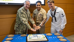 Military personnel cutting cake at  DHA Headquarters