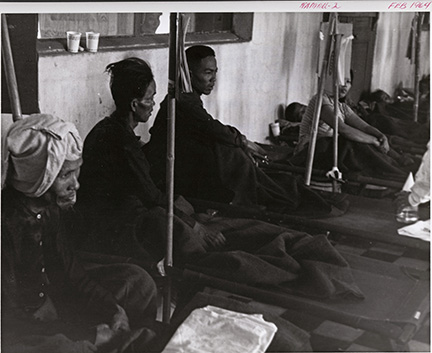 Cholera patients begin to recover after receiving special treatment prescribed by CAPT Robert Phillips and his medical research unit. They await transfer to the convalescent ward in the Cho Quan Hospital in the Saigon area (1964). (BUMED archives)