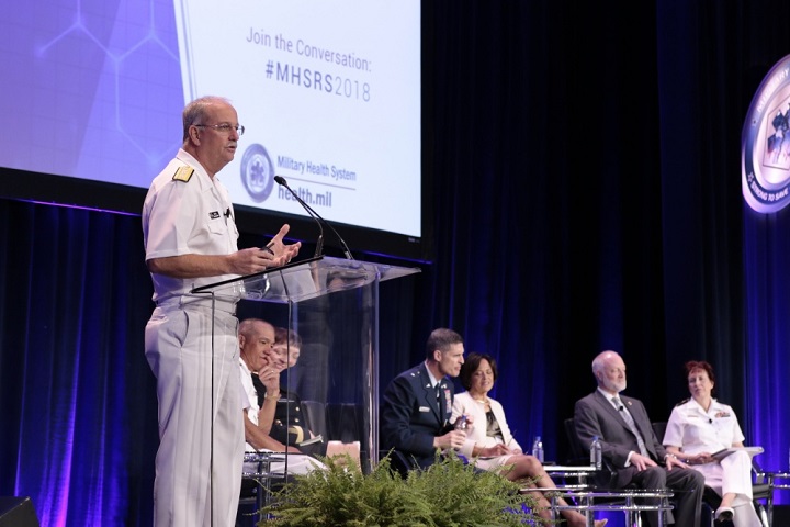 Navy Rear Adm. Bruce Gillingham, director, medical resources, plans and policy, Office of the Chief of Naval Operations, and other senior leaders speak at the general officer round-table discussion during the 2018 Military Health System Research Symposium. (MHS photo)