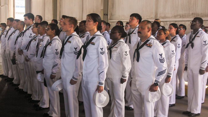 Sailors with Navy Medicine Readiness and Training Command Pearl Harbor stand at attention.