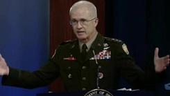 Defense Health Agency Director Lt. Gen. (Dr.) Ronald J. Place speaking at a press conference