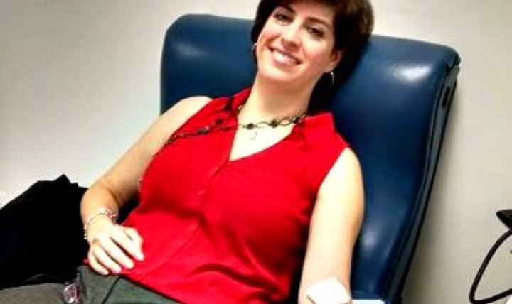 Lisa Croswait donates whole blood with Armed Services Blood Program at the Pentagon Blood Donor Center.  