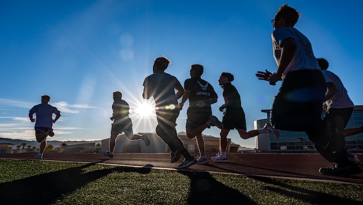 Airmen and special warfare recruits participate in physical training during Exercise Bolt and Dagger