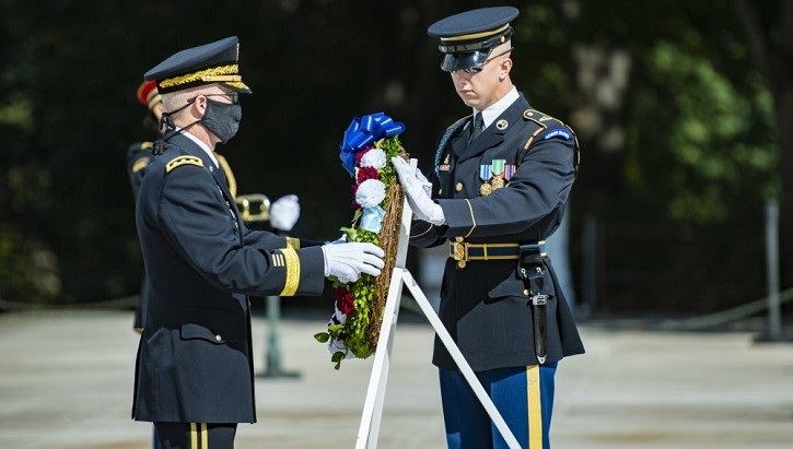 Lt. Gen. Ronald Place holding a wreath at Arlington National Cemetery