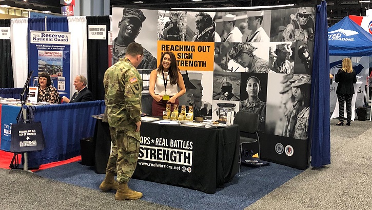 The Real Warriors Campaign member engages with a service member at the Association of the United States Army Annual Meeting and Exposition in Washington, D.C. (Courtesy photo)