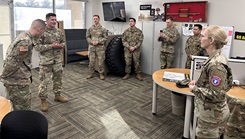 military medical personnel in a meeting