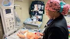 Hospital Corpsman 2nd Class Jazmine Strain, a respiratory therapist assigned to Naval Medical Readiness and Training Command (NMRTC) Sigonella, participates in the Neonatal Resuscitation Program