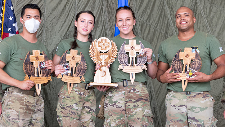 The U.S. Air Force Academy’s 10th Medical Group bucked the competition to take home first place at the 2023 Medic Rodeo competition at Cannon Air Force Base, N.M. Aug. 21-25. Pictured from left to right; Master Sgt. Albert Santoscoy, the Cadet Medicine Plans and Operations Section chief; Senior Airman Olivia Beckner, a diagnostic imaging technician with the 10th Surgical Operations Squadron; Staff Sgt. Jessica Plooy, a medical technician with the 10th OMRS; and Capt. Sean Bundles, a Cadet Clinic administrator with the 10th Medical Group. (Photo: U.S. Air Force Airman 1st Class Drew Cyburt)