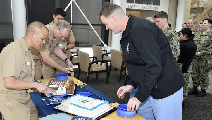 As Navy physicians and surgeons assigned to Naval Hospital Bremerton took a brief respite to recognize their Navy Medical Corps 153rd birthday, March 4, 2024, the traditional cake-cutting portion of the celebratory event provided staff members to extend well-wishes to the approximately 35 Medical Corps officer assigned to the command. (Photo: Douglas H Stutz)
