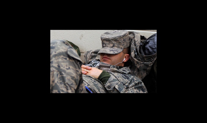 U.S. Army Sgt. Jeremy Minner, 153rd Military Police Company, Delaware Army National Guard, sleeps on his flak jacket at the Trent Lott National Guard Training Complex in Gulfport, Miss. 