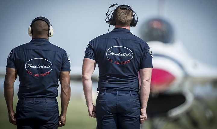 U.S. Air Force Thunderbirds maintenance professionals, wearing hearing protection, watch  Thunderbird 5 taxi out during the Wings of Freedom Open House and Air Show performance, Altus Air Force Base, Oklahoma. Auditory injury is an invisible condition that is often viewed as an unavoidable, acceptable consequence of military service, but service-related hearing loss is largely preventable. Most hearing protection, if worn properly during noise-hazardous conditions, is effective in preventing hearing loss. (U.S. Air Force photo by Master Sgt. Stan Parker)