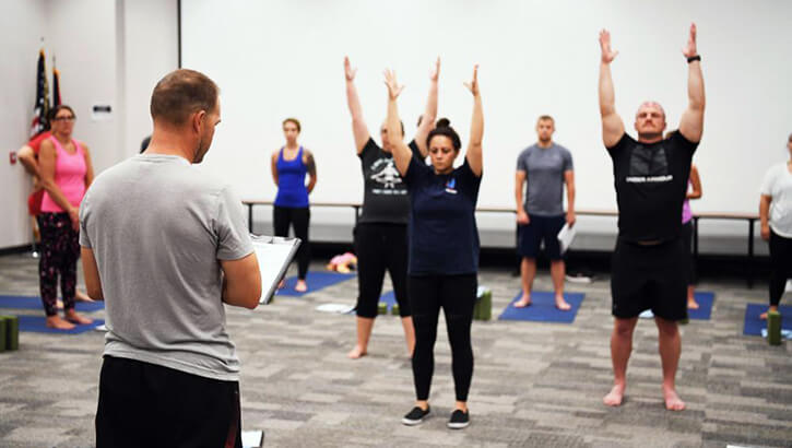 Airman teaches yoga to a variety of Airmen in Springfield, Ohio, so they learn mental and physical resiliency.