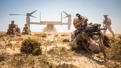 A Marine posts security during an exercise on Karan Island, Kingdom of Saudi Arabia, April 23, 2020. 