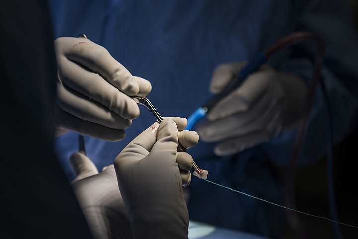 Airmen assigned to the 99th Medical Group perform in an orthopedic spine surgery at Nellis Air Force Base, Nevada. (U.S. Air Force photo by Airman 1st Class Andrew D. Sarver)