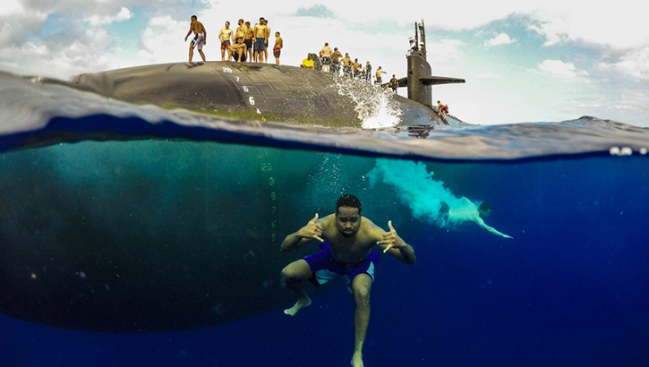 Image of Military personnel participating in a swim call.