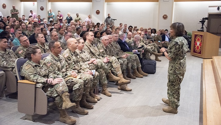 Navy Vice Adm. Raquel Bono, Defense Health Agency director, discusses the DHA transition during a town hall meeting at Brooke Army Medical Center. On Oct. 1, 2019 BAMC will transition under DHA command and authority. (U.S. Army photo by Jason W. Edwards)