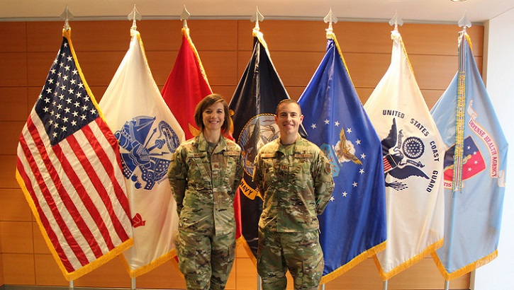 Air Force Maj. Nicole Ward, left, and Capt. Matthew Muncey, program managers with the Air Force Medical Service Transition Cell, at the Defense Health Headquarters in Falls Church, Virginia, Jan. 9, 2020. (U.S. Air Force photo by Josh Mahler)