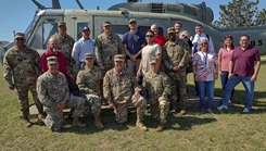 Leaders with the U.S. Army Medical Materiel Development Activity and Regional Training Site-Medical stand for a group photo during a hospital conversion fielding at Fort Gordon, Georgia, on March 7. USAMMDA’s Force Sustainment Directorate, which worked for more than a year to coordinate the hospital center shipment, is responsible for the wholesale procurement, production, fielding, sustainment, and recovery of medical sets, kits, and outfits.  (Photo by Rick Bower, U.S. Army)