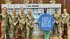 military personnel pose at ScriptCenter in Okinawa, japan