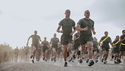 Marine Corps recruits assigned to Alpha Company, 1st Recruit Training Battalion, conduct the run portion of an initial strength assessment