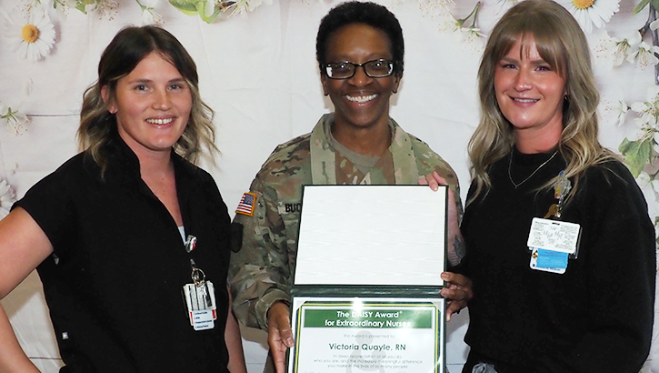 Victoria Quayle, right, a registered nurse in Evans Army Community Hospital’s Allergy Clinic, was one of three individual honorees recognized at a Daisy Award Ceremony