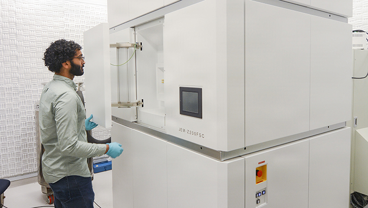  The large microscope pictured here captures thousands of images of a particle, which are then computationally reconstructed into a 3D structural map.