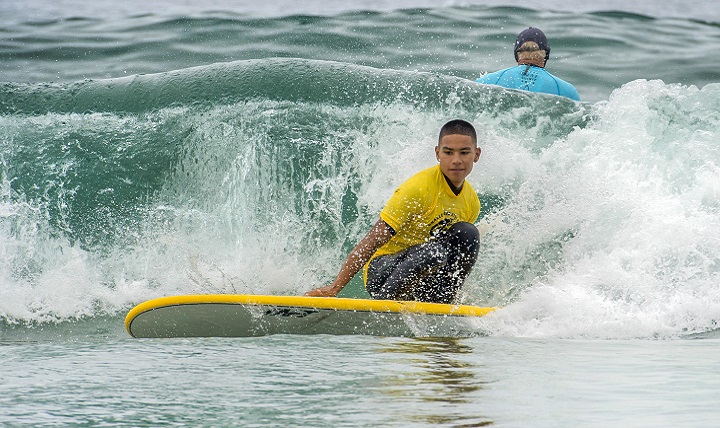 Marine Corps Cpl. Leighton Anderson surfs a closed out wave during the Naval Medical Center San Diego surf therapy clinic in Del Mar, California. Participation in the therapy clinic for patients like Leighton is medically appointed, and its many benefits include pain management and post-traumatic stress disorder treatment. (DoD photo by EJ Hersom)