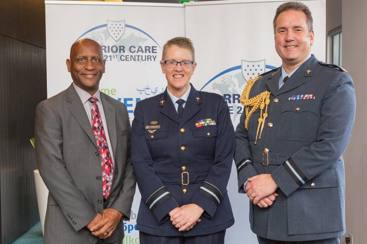 Mr. Bret Stevens, director of disability evaluation systems, DoD Health Services Policy and Oversight and United States WC21 co-chair (left), Air Vice-Marshal Tracy Smart, surgeon general, Australian Defence Force (center), and Air Commodore Rich Withnall, United Kingdom WC21 co-chair (right) pose for a photo. Senior representatives from 11 nations discussed warrior care challenges, lessons learned, and innovations during this year’s event. (Photo courtesy from the Australian Defence Force)