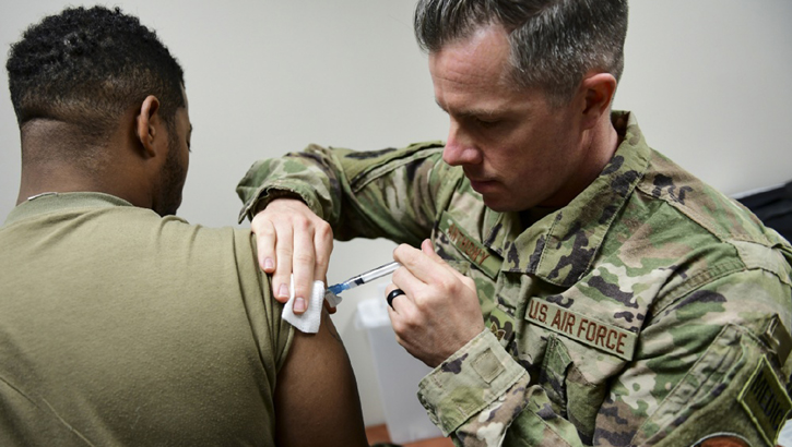 Tech Sgt. Joseph Anthony, medical technician with the 911th Aeromedical Staging Squadron, administers a vaccination to a member of the U.S. Army Reserveâ€™s 336 Engineering Company Command and Control, Chemical Radiological and Nuclear Response Enterprise Team at the Pittsburgh International Airport Air Reserve Station, Pennsylvania, April 11, 2019. Department of Defense-issued vaccinations are used to prevent a variety of diseases that military members may encounter in the course of their duties. (U.S. Air Force photo by Joshua J. Seybert)