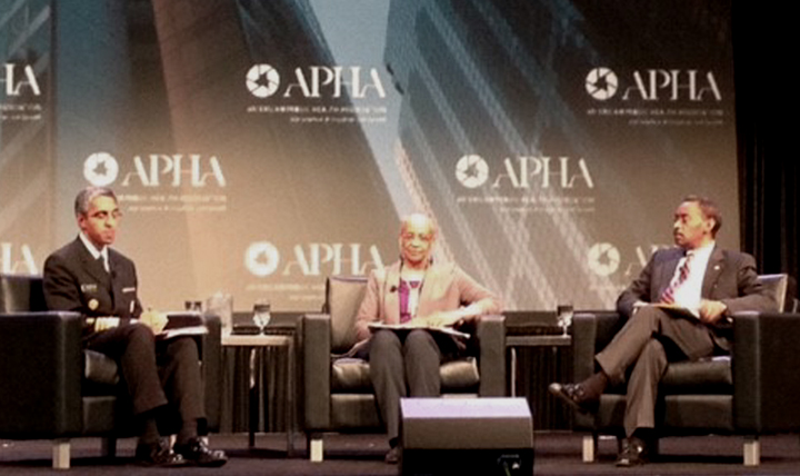 Dr. Jonathan Woodson (right), assistant secretary of Defense for Health Affairs, joins U.S. Surgeon General, Dr. Vivek Murthy  (left), and Dr. Shiriki Kumanyika (center), American Public Health Association (APHA) president, on stage for the APHA’s 143rd Annual Meeting and Exposition, in Chicago, Illinois, Nov. 2, 2015. The event is the largest meeting of public health professionals in the United States. During the session, Woodson talked about what the Department of Defense is doing to improve the health of its population. As DoD has been active in the development and implementation of the National Prevention Strategy, APHA was interested in Woodson’s insights on how to improve the health and wellness of more than 9.5 million members of the American military community. (Courtesy photo)  