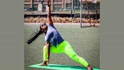 Military personnel doing a yoga pose