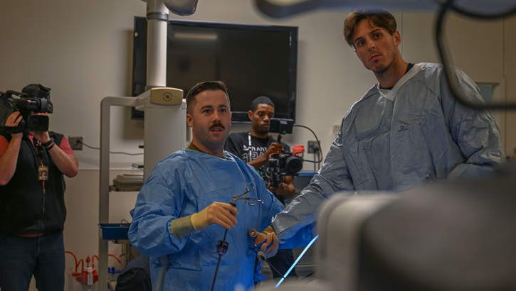 San Antonio Spurs Power Forward Zach Collins participates in a surgical demonstration.