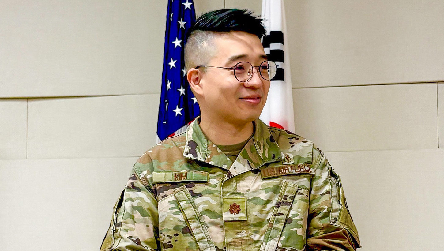U.S. Air Force Maj. Shawn Kim gives a speech during a ceremony celebrating his promotion