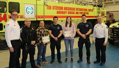 U.S. Air Force Lt. Col. Jeremy Strohmayer, anesthesia flight commander for the 673d Medical Group at Joint Base Elmendorf-Richardson, receives Chief’s Recognition, an award from the chief of the Anchorage Airport Police and Fire Department