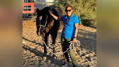 U.S. Army Capt. Kyra Maggio enjoys caring for horses as part of her therapy at the Fort Bliss, Texas, soldier recovery unit. She shares her experience at the soldier recovery unit, where she joined others in treatment. (Photo by Joy Ferguson)