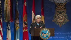 Former Army Spc. 5 James C. McCloughan speaks during his Medal of Honor Hall of Heroes induction ceremony 