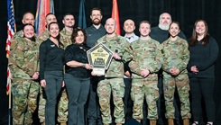 Members of the 17th Field Artillery Brigade, I Corps, Joint Base Lewis-McChord, Washington, accept an award for "Best in Class for the Regular Army" 