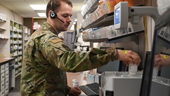 U.S. Air Force Senior Airman Stuart Sheer, a 28th Medical Group pharmacy technician, assembles an order of prescriptions