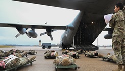Airmen with the Nebraska Air National Guard’s Chemical Biological Radiological Nuclear Enhanced Response Force Package Detachment-1 and 55th Wing role play as injured patients, Nov. 13, 2024, during Joint National Disaster Medical System Exercise at Offutt Air Force Base, Nebraska. The exercise is designed to validate the Omaha Federal Coordinating Center Patient Reception Site Operations Plan in response to a catastrophe scenario. (Photo by U.S. Air National Guard Senior Airman Jeremiah Johnson)