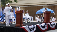 Navy Medicine Readiness and Training Command Camp Pendleton Commander Capt. Virginia Damin (right) returns the salute from Capt. Michael Barry, NMRTC executive officer, during the NMTC Camp Pendleton change of command ceremony