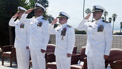 Military personnel saluting