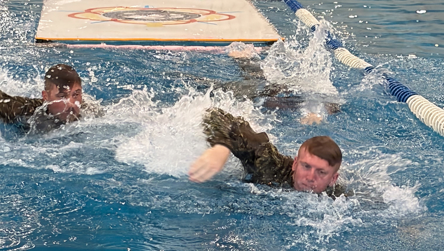 U.S. Army Reserve Capt. Tyler Davis participates in the Obstacle Swimming event 