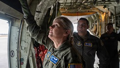 Lt. Col. Roseann Teckman, a flight nurse assigned to the 315th Aeromadical Evacuation Squadron, completes roll-up door training during an aircraft hands-on training event