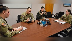 Dr. (Lt. Col.) Kimberley Phillips, U.S. Army Sustainment Command’s command surgeon, conducts a staff meeting March 6 at Rock Island Arsenal, Illinois. From left, Capt. Timothy Johnson, ASC environmental science and engineering officer; Sgt. 1st Class Fidel Distel, noncommissioned officer in charge and ASC’s combat medic; and Carter Meredith, ASC health administrator. 