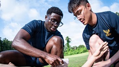 Navy Corpsman assigned to the Navy Medicine Readiness and Training Command Cherry Point treat a simulated casualty