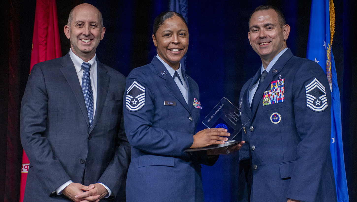 Air Force Senior Master Sgt. Andria C. McGuire, Luke Operational Medical Readiness Squadron, Luke Air Force Base, Arizona, receives the 2025 MHS Enlisted Leadership Excellence Award for senior non-commissioned officer