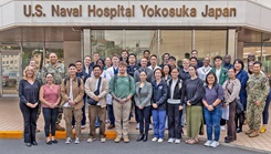  Capt. Torrin W. Velazquez, director of U.S. Naval Hospital (USNH) Yokosuka, poses for a group photo with instructors, organizers and participants of the High-Level Disinfection and Sterilization (HLD/SPD) workshop outside USNH Yokosuka